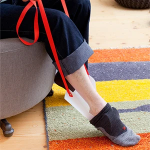 Enfile-chaussettes Enfile-chaussettes